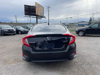 2016 Honda Civic touring comes with Push button, Navigation, backup cameras, sunroof, heated seats,... (image 4)