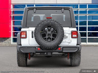 This Jeep Wrangler has a strong Intercooled Turbo Premium Unleaded I-4 2.0 L/122 engine powering thi... (image 6)