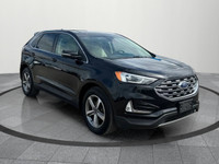 Up for sale is a well-maintained 2019 Ford Edge SEL, featuring a sleek black exterior and a rare tan... (image 7)