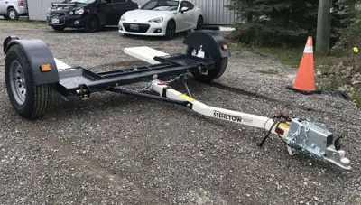 FEATURE LOADED TOW DOLLY WITH SURGE BRAKES UPGRADE, ADJUSTABLE TIE DOWN STRAPS & ANTI RADDLE HOOK IN...