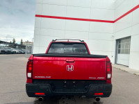 Our 2023 Honda Ridgeline Touring in Radiant Red Metallic is a local lease return! Call to book an ap... (image 4)