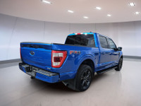 Experience ultimate driving luxury with the Ford F-150, featuring a robust 4WD and a smooth 10-speed... (image 3)