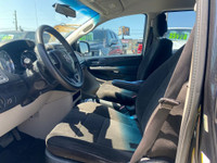 Meet the 2012 Dodge Grand Caravan SE 3.6L, the ultimate minivan for families, road trippers, or anyo... (image 4)