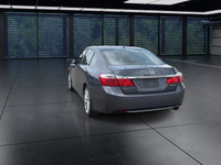 A rare and engaging manual transmission sedan offering comfort and performance. The Touring trim inc... (image 6)