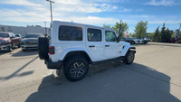 This 2025 JEEP WRANGLER 4-DOOR SAHARA has the following options Cloth Low-Back Bucket Seats, Remote... (image 4)