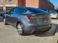 Get ready to plug into the future with this sleek 2023 Tesla Model Y Standard Range, dressed in a sh... (image 4)