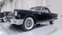 This stunning tribute 1957 E-Thunderbird, a true black beauty with a rich history, was originally ac... (image 2)