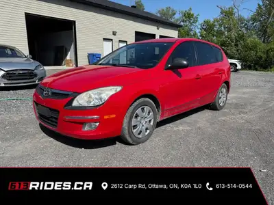 Looking for a practical and versatile vehicle that's ready for anything? Check out this sleek red 20...