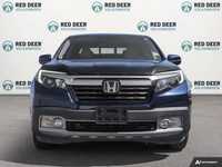 Experience the exceptional blend of power and comfort with the 2019 Honda Ridgeline Touring AWD in a... (image 2)