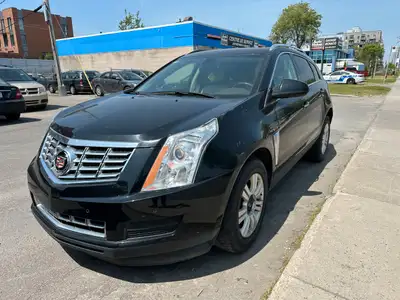 2015 Cadillac SRX - 12,999$ 3.6L V6 engine - AWD Fuel consumption 12.3L/100km 2 sets of wheels (wint...