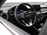 Experience refined performance and modern comfort with the 2024 Kia Forte 5 EXâ€”a sleek, sporty hat... (image 5)