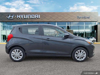 This 2021 Chevrolet Spark 1LT Hatchback offers surprising practicality in a compact package. Its pep... (image 5)