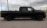 This Ram 2500 has a powerful Regular Unleaded V-8 6.4 L/392 engine powering this Automatic transmiss... (image 4)