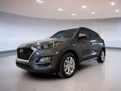 Discover the 2020 Hyundai Tucson Preferred, a versatile SUV designed to meet the demands of Canadian...
