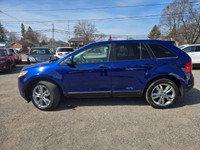 VERY WELL DRIVING SHARP LOOKING IMPACT BLUE ON BLACK FORD SPORT UTILITY VEHICLE W/ GOOD MILEAGE, EQU... (image 1)