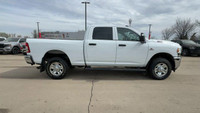 This Ram 2500 is equipped with: Cloth Front 40/20/40 Bench Seat, Radio: Uconnect 5 Nav w/8.4 Display... (image 8)
