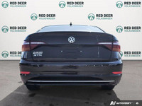 The pre-owned *2019 Volkswagen Jetta Comfortline* is a stylish and practical sedan built for drivers... (image 5)