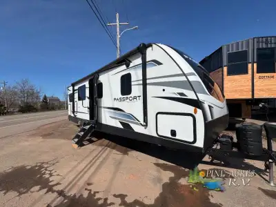 Keystone Passport GT travel trailer 2704RK highlights: Rear Kitchen Fireplace Front Private Bedroom...