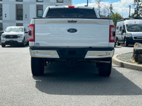 This 2021 Ford F-150 LARIAT has a Star White Exterior and Black Leather Interior with seating for 5.... (image 4)