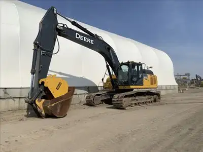 Hours: 6938 | Location: Regina, SK, CA | Arms: Long Arm; Attachments: Aux Hydraulics; Buckets: w/ Bu...