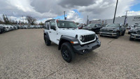 This Jeep Wrangler is equipped with: Cloth Low-back Bucket Seats, Manual Adjusting Seats, Radio: Uco... (image 4)