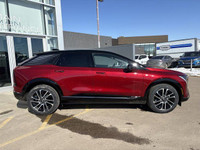 Finished in a head-turning Radiant Red Tricoat with a sleek Noir interior, the 2025 Cadillac Optiq E... (image 9)