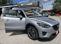 ...WE INCLUDE EVERYTHING.…CX-5 GT AWD NAVI BT REV CAM SUNROOF HEAT LEATHER.…PERFECT ........PRICE IN... (image 9)