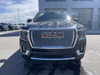 The 2023 GMC Yukon XL Denali is a full-size SUV that redefines luxury and capability, offering an ex... (image 1)