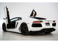 This Powerful 2012 Lamborghini Aventador LP 700-4 epitomizes the pinnacle of automotive engineering,... (image 5)