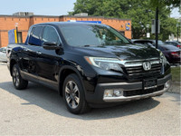Pristine condition and Fully loaded Honda Ridgeline Touring with LOW KMs! This 4 door All Wheel Driv... (image 1)