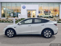 This Tesla Model Y boasts a Electric engine powering this Automatic transmission. Window Grid Antenn... (image 1)