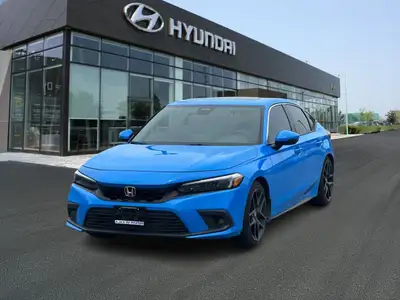 he 2023 Honda Civic Sport Touring Hatchback offers a dynamic blend of performance, style, and advanc...