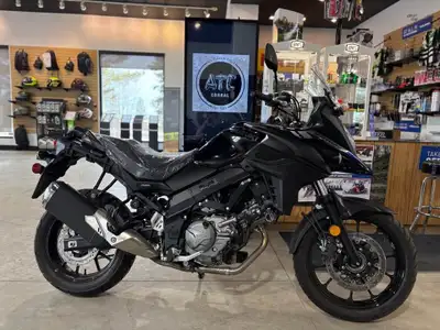 In stock we have a Suzuki V-STROM 650XT (UNIT IS BLUE AND WHITE, PHOTOS OF BASE VSTROM ARE USED) (Th...