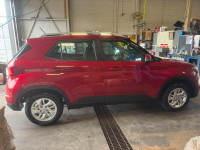 This 2023 Hyundai Venue Preferred in bold red is your ideal compact SUV – stylish, efficient, and ci... (image 2)