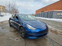 This stunning TESLA MODEL 3 with DEEP BLUE PEARL and black interior is complimented with gun metal A... (image 9)