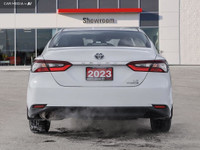 WAS: $34250 NOW: $32750 plus taxes and licensing feesThe 2023 Toyota Camry Hybrid in Super White is... (image 4)