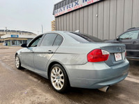 Discover the 2006 BMW 328i Coupe, a luxury vehicle that offers a perfect blend of performance, style... (image 2)