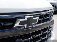 Command the road in this powerful 2024 Chevrolet Silverado 1500 RST! This head-turning Summit White... (image 8)