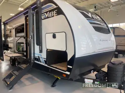 Forest River Vibe travel trailer 22RK highlights: Bar Top Outside Kitchen RV Queen Bed Panoramic Win...