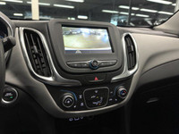 The 2019 Chevrolet Equinox LS is a compact SUV equipped with a 1.5L turbocharged I4 engine and a 6-s... (image 9)