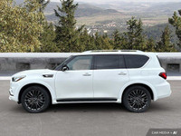Command the road in this 2023 INFINITI QX80, a powerful SUV boasting a luxurious interior and impres... (image 1)