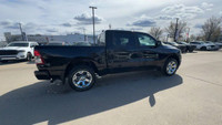 This 2024 RAM 1500 TRADESMAN CREW CAB 4X4 has the following options Cloth 40/20/40 Bench Seat, Uconn... (image 8)