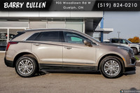 The 2023 Cadillac XT5 FWD Luxury in an elegant tan hue with its nimble front-wheel drive is all abou... (image 2)