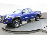 Introducing the sleek blue 2023 Toyota Tacoma. This truck is packed with various features to make yo... (image 2)