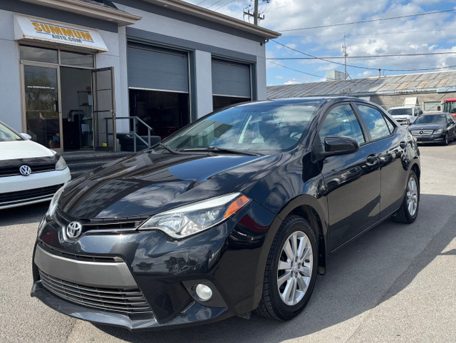 Toyota Corolla TOIT OUVRANT - CAMÉRA DE RECUL - MAGS 2016 in Cars & Trucks in Laval / North Shore