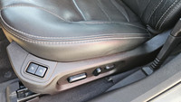 Experience luxury in a compact package. This car boasts a sumptuous leather interior, with heated an... (image 8)