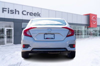 The 2021 Honda Civic EX is a stylish and efficient compact sedan that offers a smooth ride, modern t... (image 5)