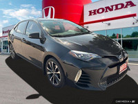 This 2017 Toyota Corolla SE boasts a sleek Slate Metallic exterior and a comfortable BLACK SOFTEX LE... (image 7)
