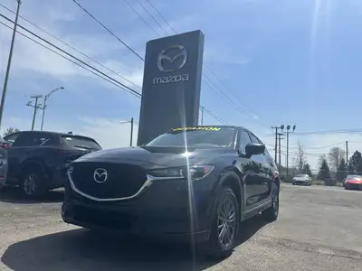 Ce Mazda CX-5 2021 est disponible chez Mazda St-Jérôme à Saint-Jérôme. Contactez notre équipe des ve...