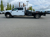 This 2021 Ford F-550 XLT has an Oxford White exterior and Earth Grey cloth seats with seating for 5.... (image 2)